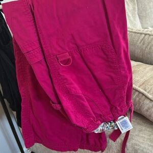 The top is the brand MC in a size small the bottoms are X small in the brand Koi